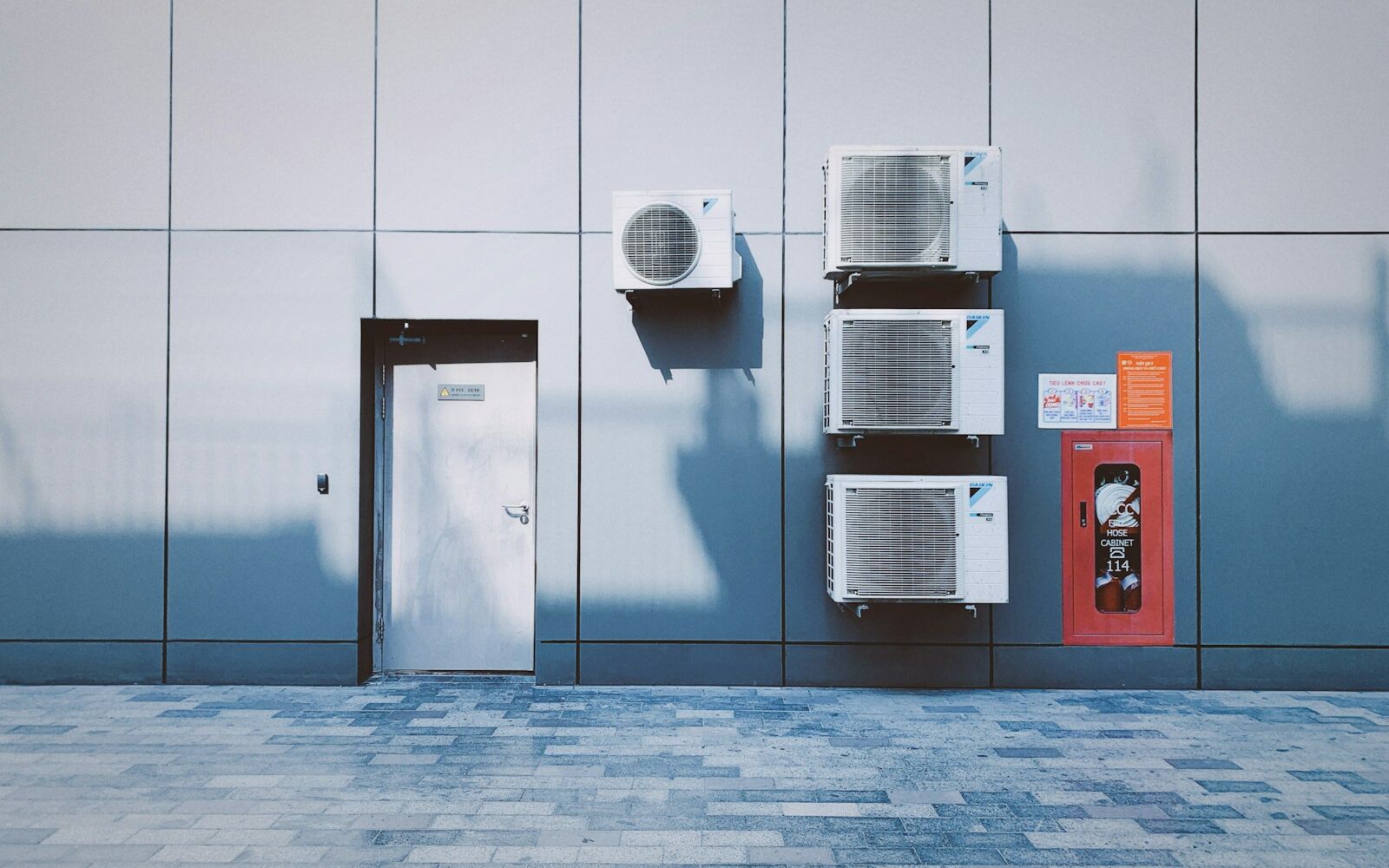 Outdoor air conditioning units mounted on a building wall