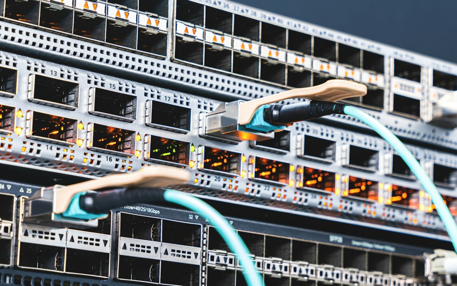 Network switches with cables connected in a rack